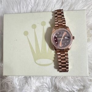 Rolex Rose Gold Watch with Diamond Bezel